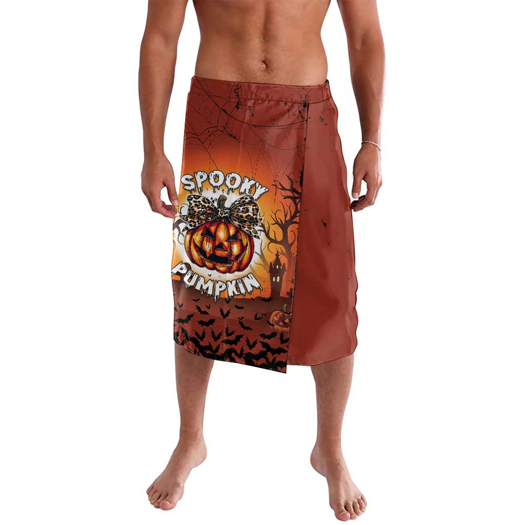 Halloween lavalava sarong with spooky pumpkin graphic, dark orange and black print