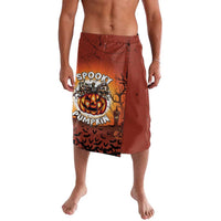 Halloween lavalava sarong with spooky pumpkin graphic, dark orange and black print