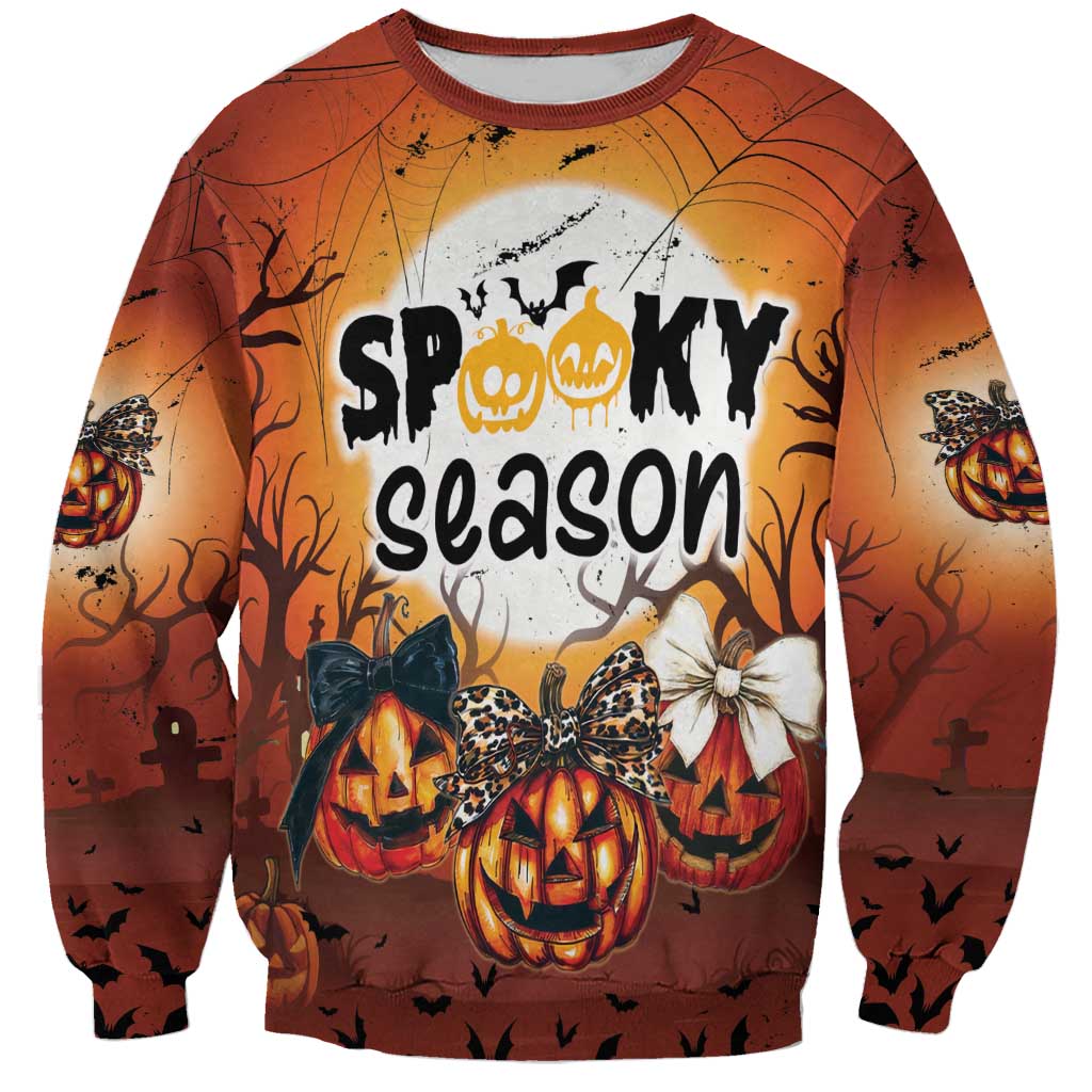 Unisex Halloween sweatshirt, orange “Spooky Season” front with jack-o’-lantern graphic