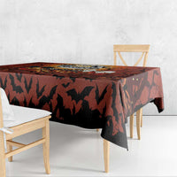 Dark orange Halloween tablecloth with bat silhouettes and falling vine pattern