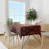 Orange Halloween tablecloth with spooky bat pattern, styled on a dining table