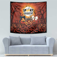 Orange Halloween tapestry with “Spooky season,” jack-o’-lantern pumpkins, bats, and dark trees.
