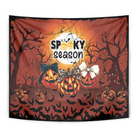 Orange Halloween tapestry with jack-o’-lantern pumpkins, bats, and “Spooky season” centered graphic.