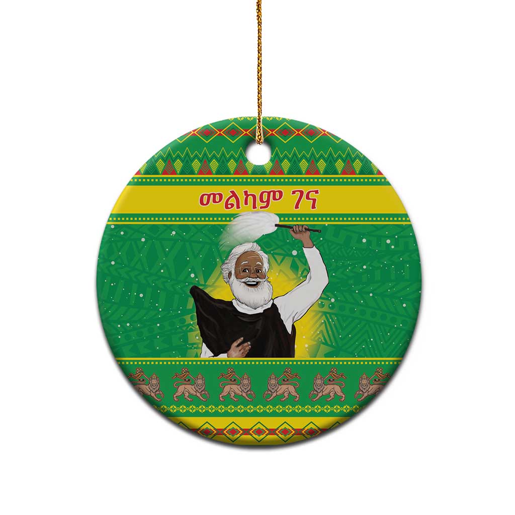 Green round ceramic Christmas ornament with bearded figure, gold hanging loop