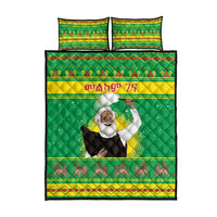 Green quilt bed set front view: portrait center, red-and-yellow geometric trim, 2 matching shams