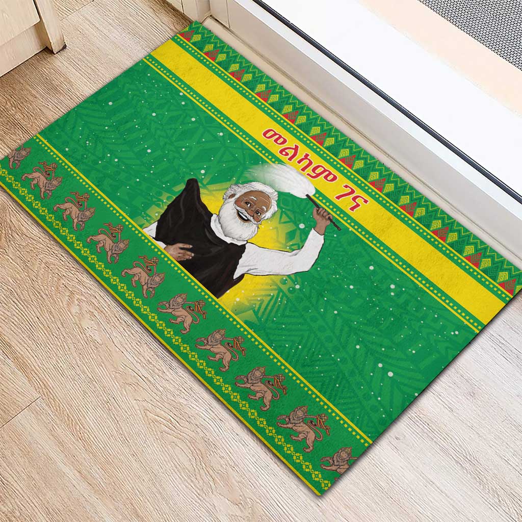 Green rubber Christmas doormat with raised Santa-style figure illustration and animal border