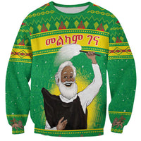 Unisex green Christmas sweatshirt with colorful Ethiopian pattern and saint face graphic