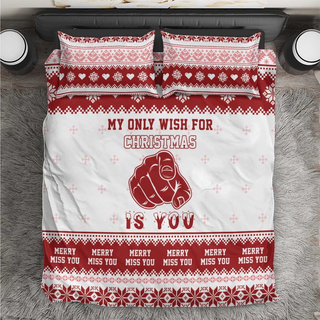 Red and white Christmas bedding set with heart patterns and 'My Only Wish for Christmas' text