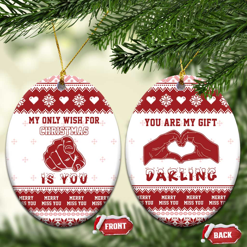 Two red-and-white round ceramic Christmas ornaments: “My only wish for Christmas is you” and “You are my gift darling”.