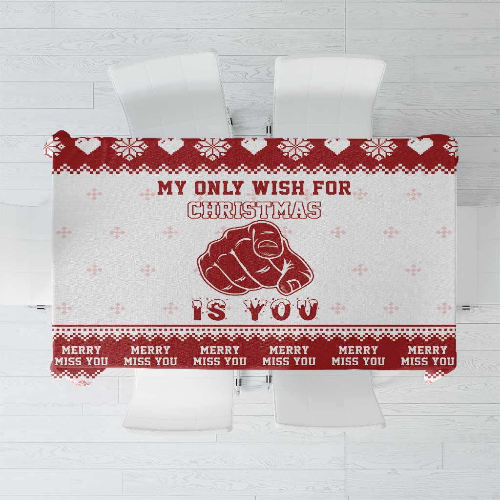 Red and white Christmas tablecloth with snowflake pattern and festive text graphic
