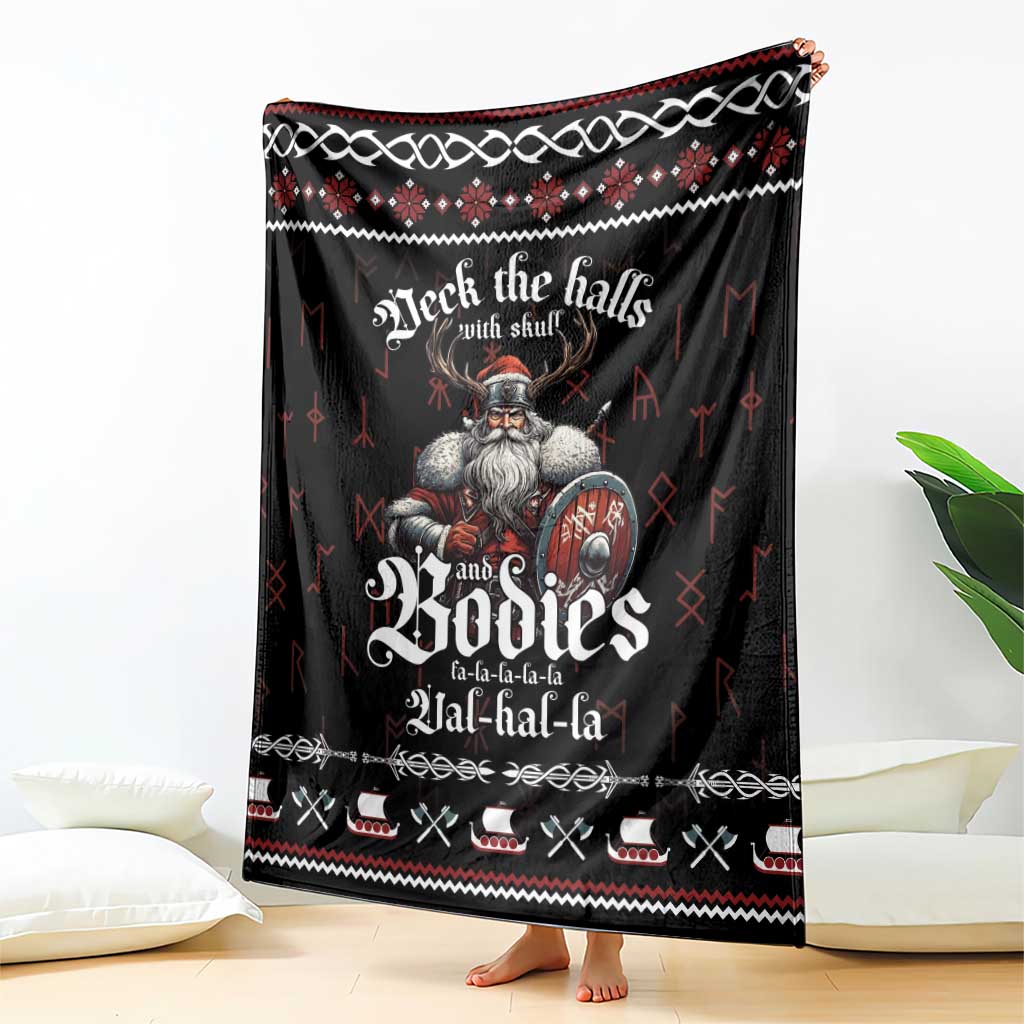 Black throw blanket featuring Viking warrior skulls with red and white festive pattern