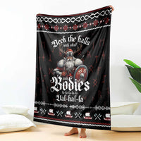 Black throw blanket featuring Viking warrior skulls with red and white festive pattern