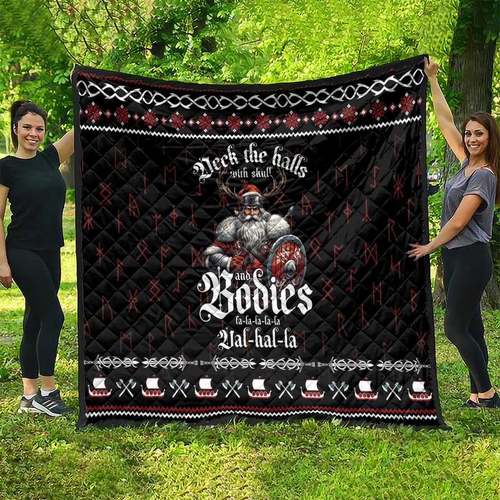 Black Viking-themed Christmas quilt with central warrior graphic, red and white festive trim.