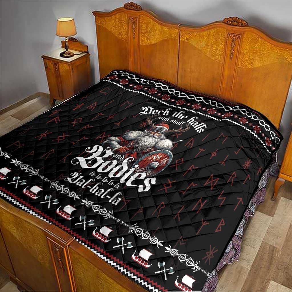 Black quilt with Viking warrior print, white decorative edging, and red diamond accents.