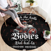 Black round Viking Christmas rug with Odin and shield graphic, holiday text visible