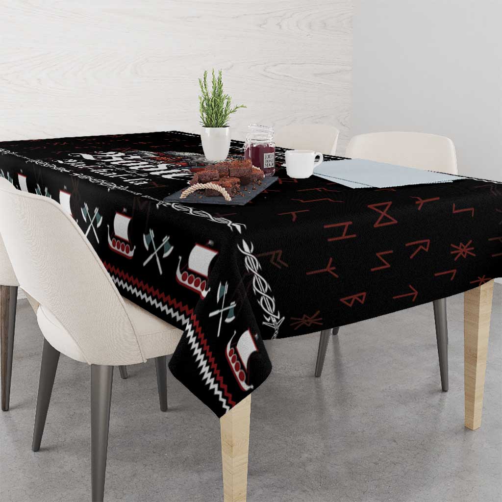 Black Viking holiday tablecloth with red and white trim pattern on tabletop