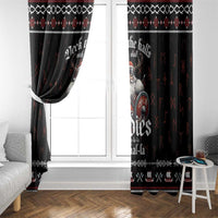 Black Viking Christmas curtain panels tied back beside a white door