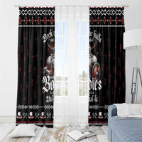 Black Viking Christmas curtain panels hanging over a bright window