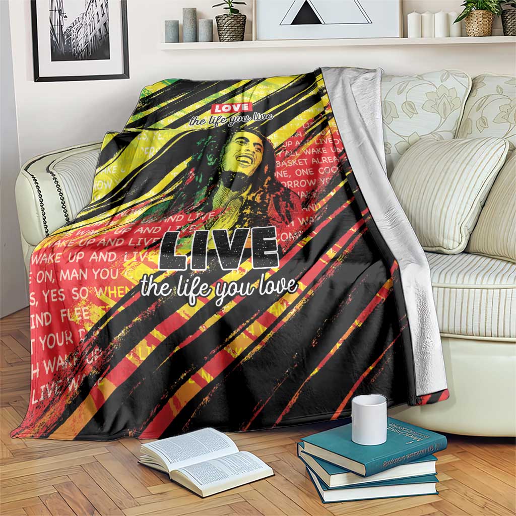 Black reggae-themed throw blanket with yellow and red diagonal stripes, LOVE and LIVE text