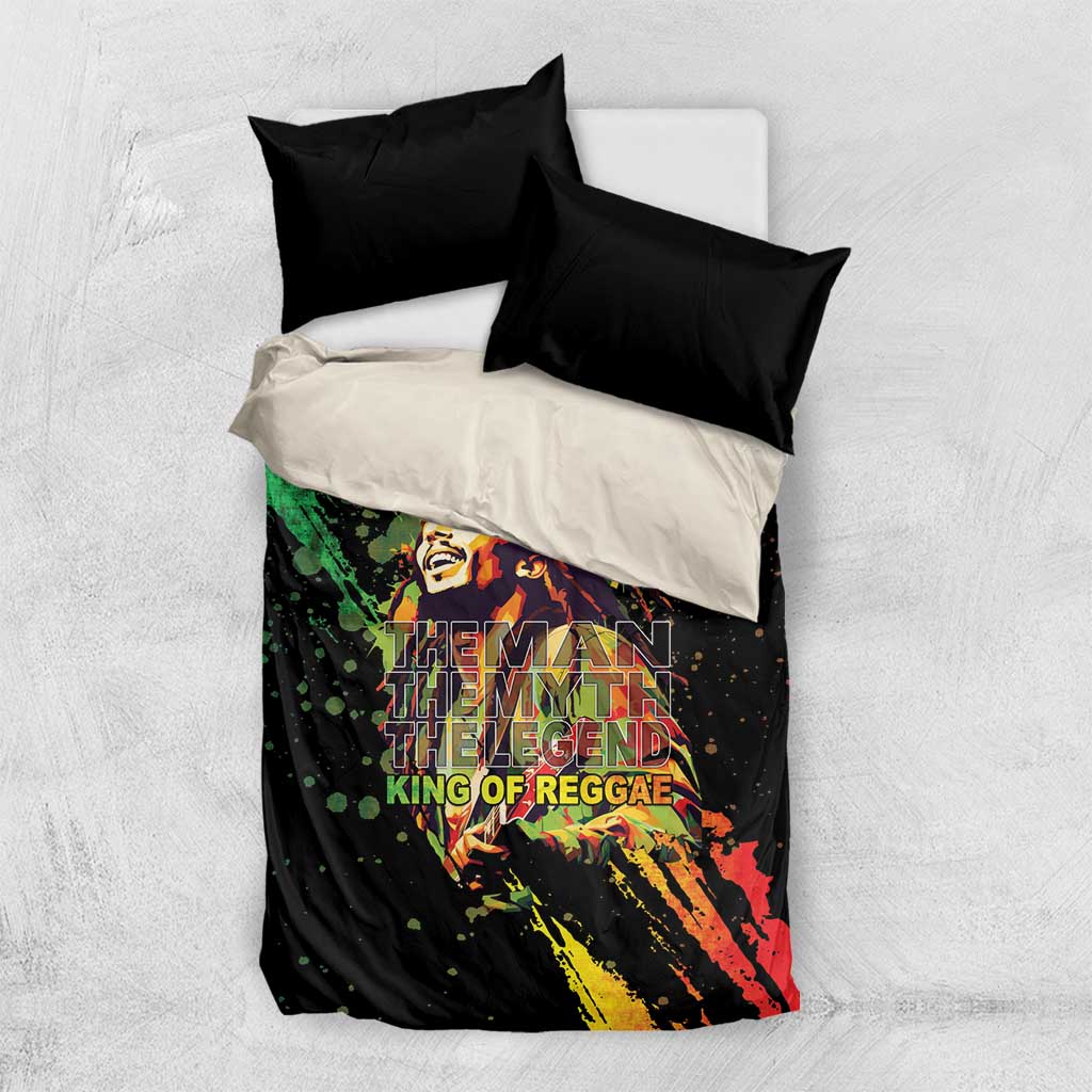 Black and white bedding set top sheet with colorful reggae portrait print and black pillows