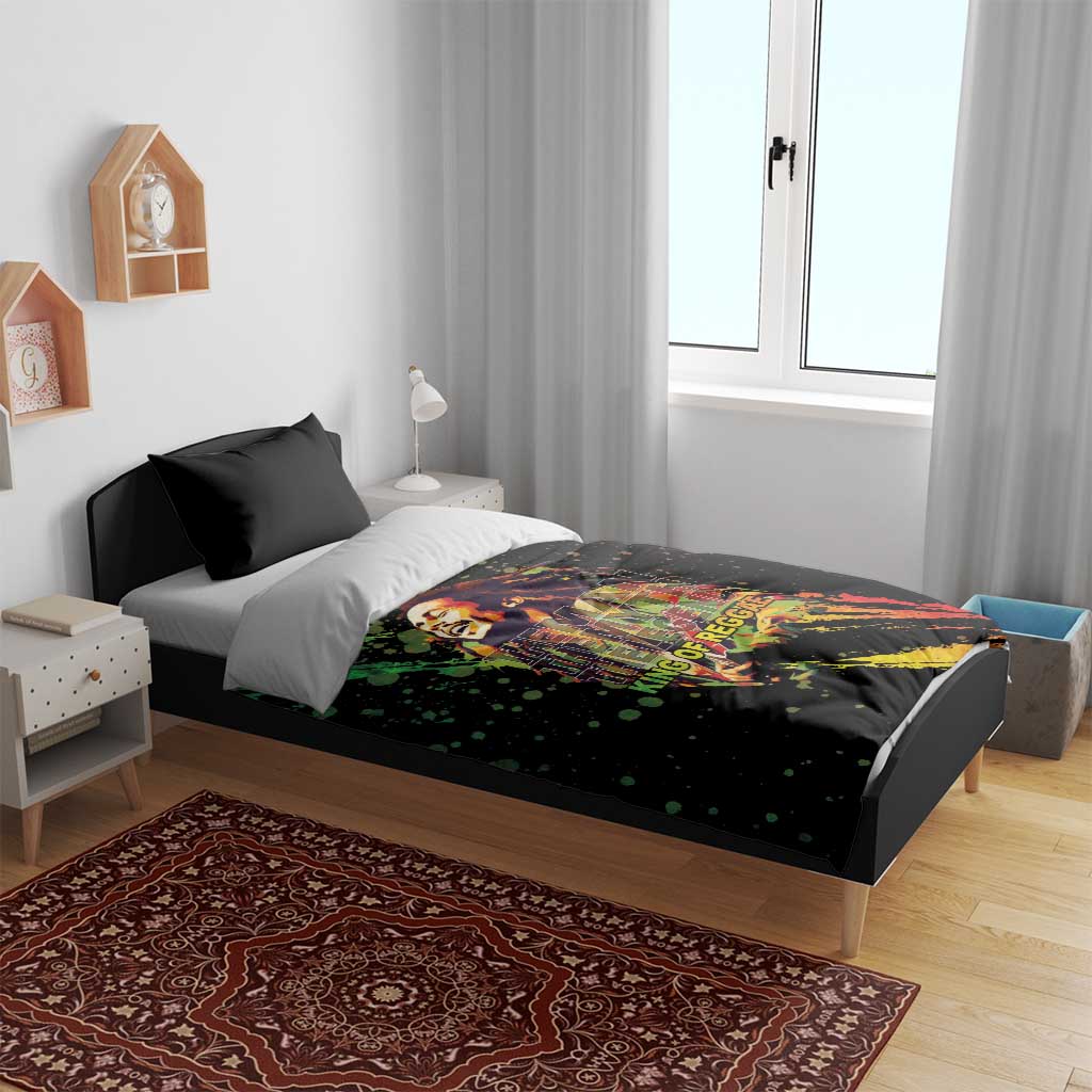 Black duvet bedding set with reggae portrait print, shown with two black pillowcases