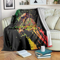 Black graphic bob blanket with reggae musician face and colorful splatter design
