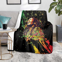 Black reggae print blanket displayed on couch chair seat with colorful portrait design