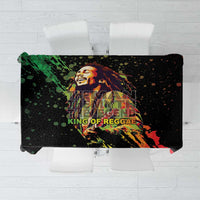 Black tablecloth with colorful graffiti-style graphic print across center