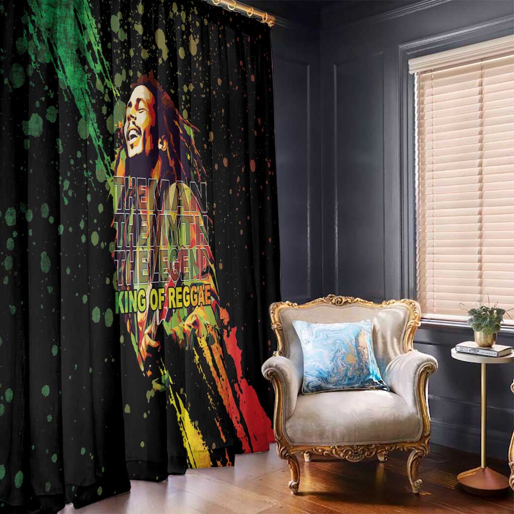 Black curtain panel with large reggae musician portrait and red-yellow-green splashes