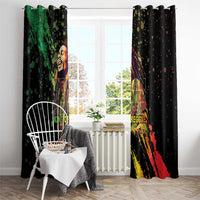 Black window curtains on a rod, featuring reggae musician graphic with green and red streaks