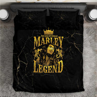 Black bedding set with gold Marley Legend graphic on duvet and matching pillowcases