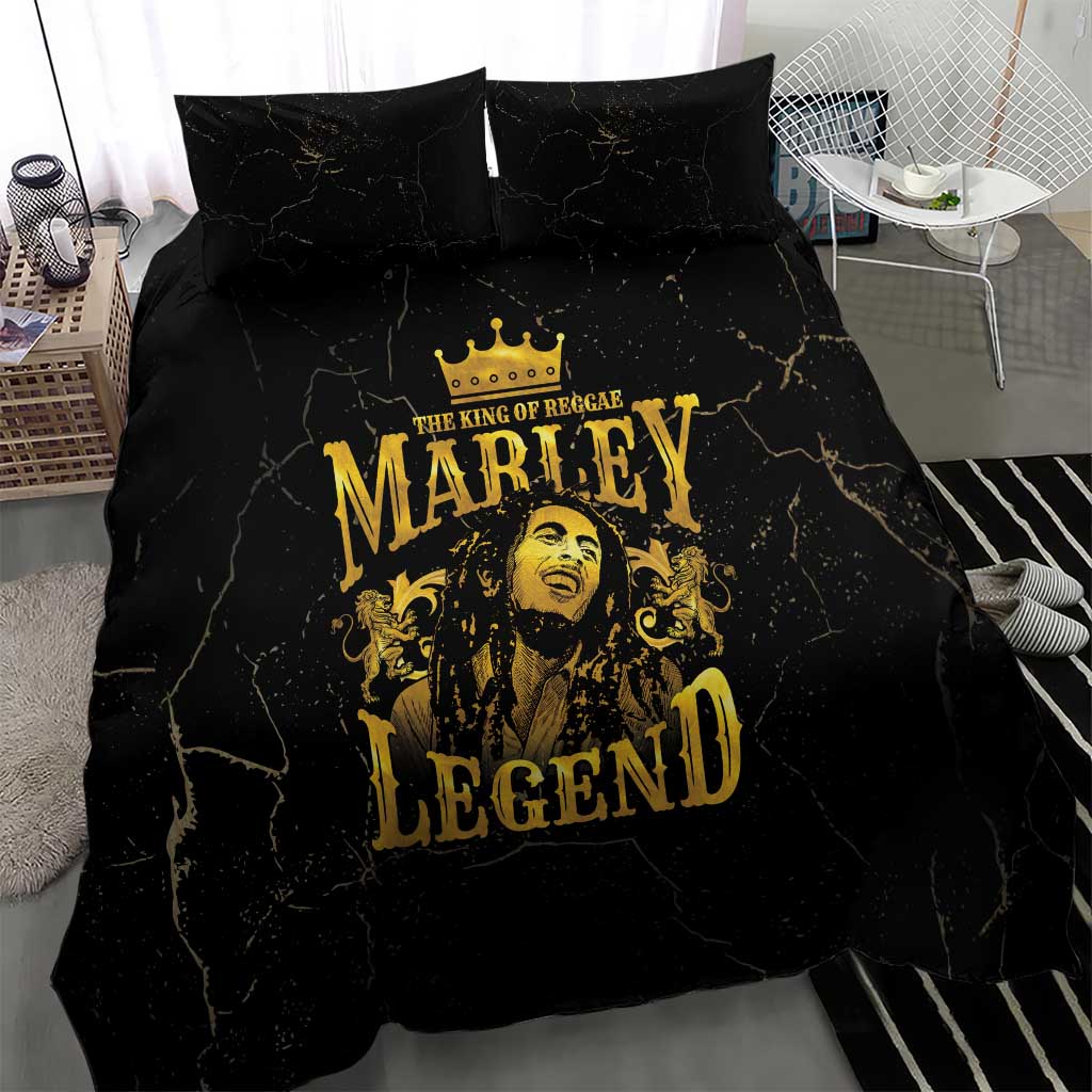 Black bedding set featuring gold Marley Legend portrait graphic on duvet and pillowcases
