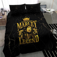 Black bedding set featuring gold Marley Legend portrait graphic on duvet and pillowcases