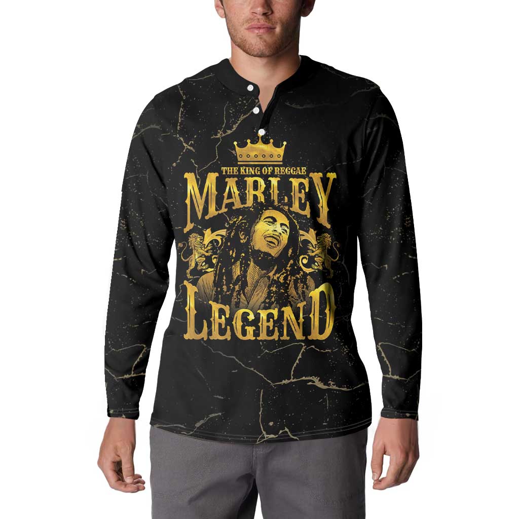 Black long-sleeve button sweatshirt with gold chest print, worn by model