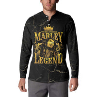 Black long-sleeve button sweatshirt with gold chest print, worn by model