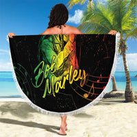 Round black beach blanket with white fringe, green Buffalo Soldier singer artwork