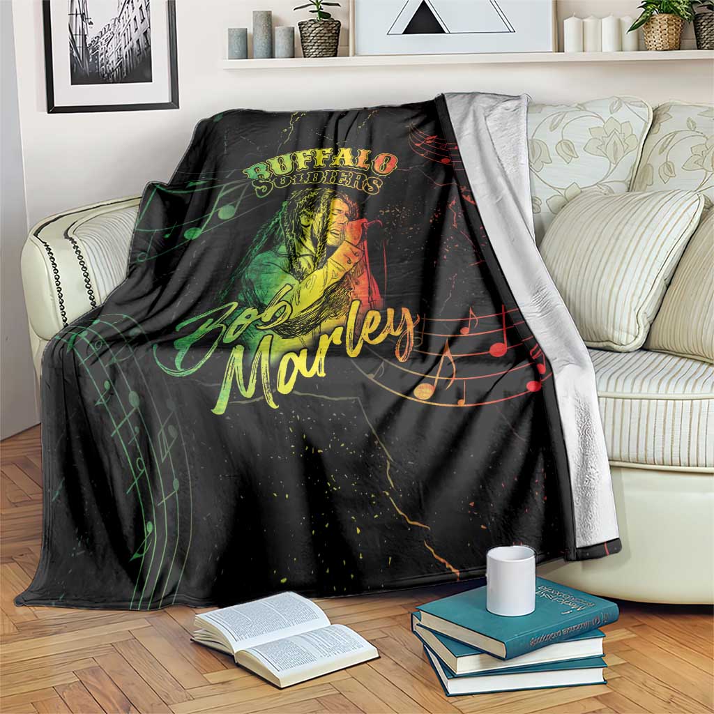 Black Buffalo Soldiers and Bob Marley graphic blanket draped on a sofa