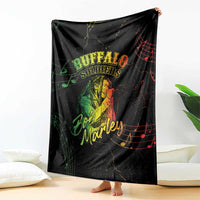 Black graphic throw blanket featuring Buffalo Soldiers and Bob Marley text