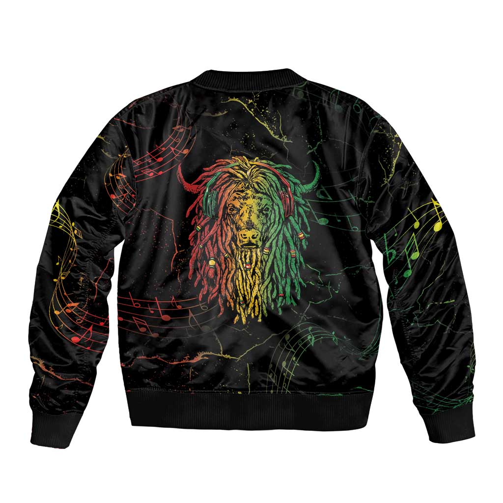 Black bomber jacket with ribbed hem and back panel featuring colorful reggae lion face
