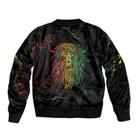 Black bomber jacket with ribbed hem and back panel featuring colorful reggae lion face