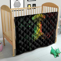 Black quilt with Buffalo Soldiers and Marley graphic on crib, diamond quilt stitching