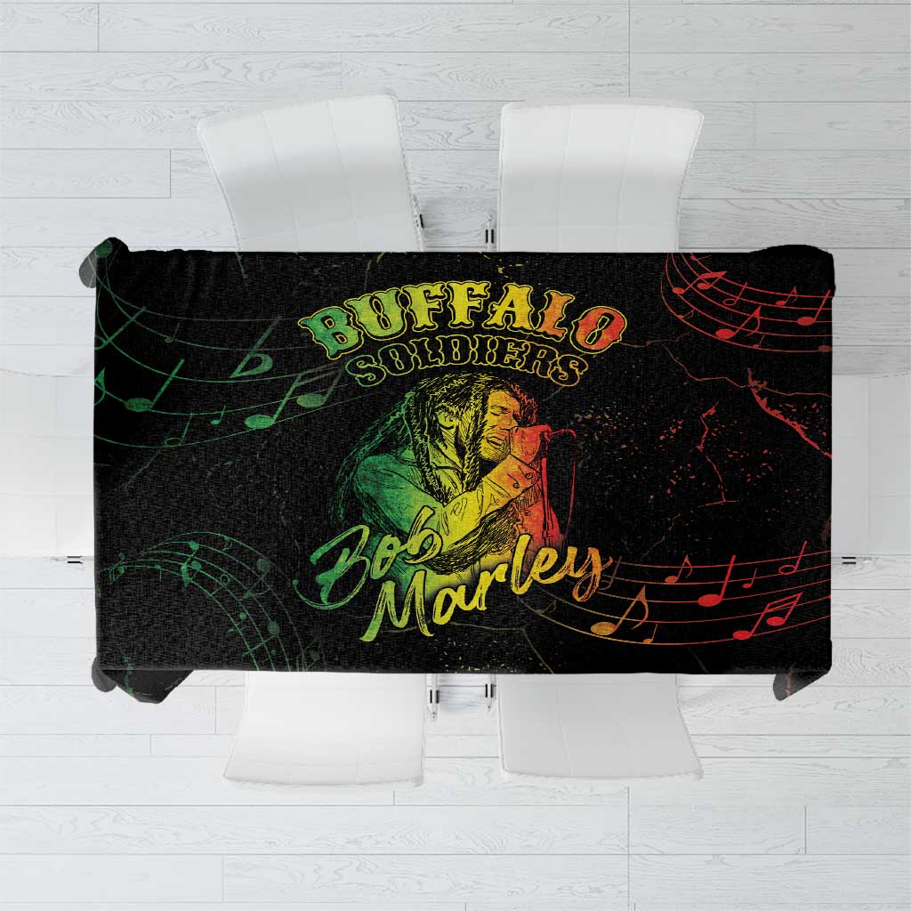 Black printed tablecloth with green and red reggae-style graphics and music notes
