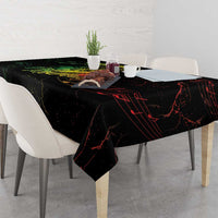 Black printed tablecloth with red music-note lines and yellow portrait graphic