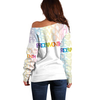 Women’s white off-shoulder sweater, back view, Pride Month rainbow text graphic