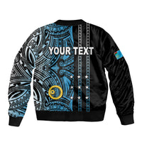 Black bomber jacket with blue tribal back panel, white patterns, ribbed cuffs and hem