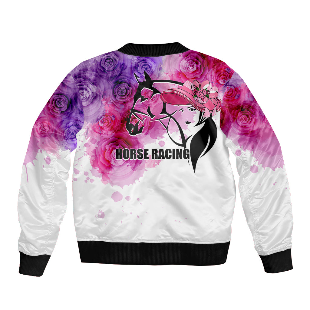 White satin bomber jacket with roses and derby girl graphic, back view, ribbed hem.