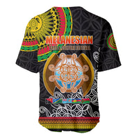 Black baseball jersey with Melanesian text and large circular art emblem