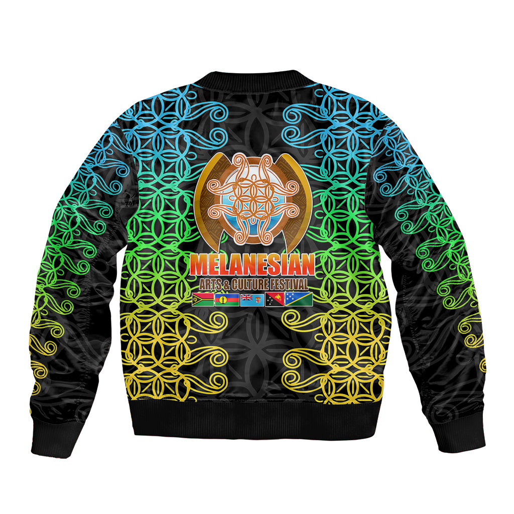 Black bomber jacket with teal green yellow tribal swirl design, front zip, ribbed hem