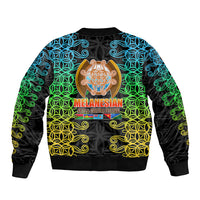 Black bomber jacket with teal green yellow tribal swirl design, front zip, ribbed hem