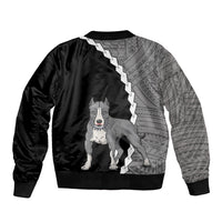 Black bomber jacket with pitbull dog graphic and tribal pattern on back, ribbed cuffs